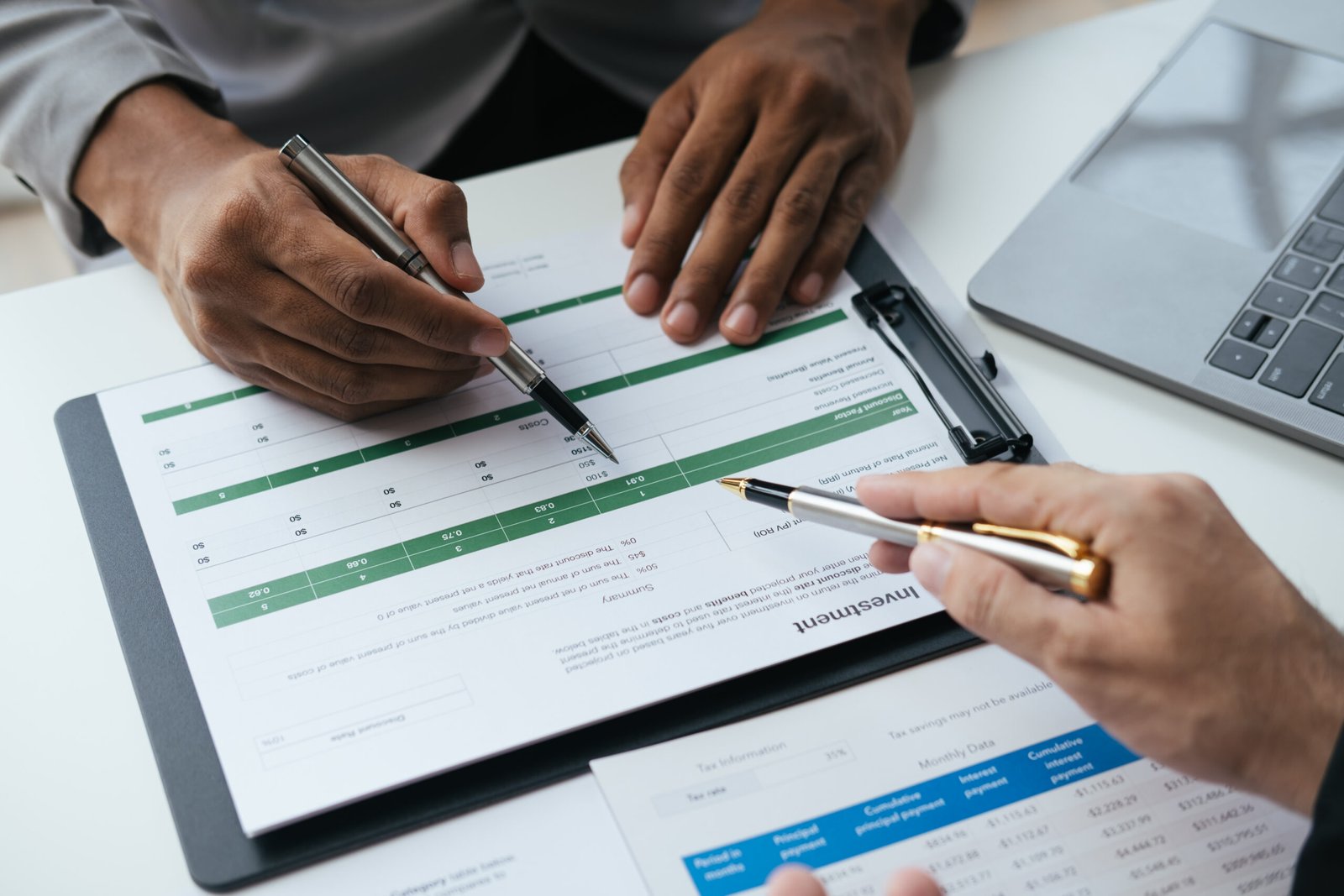 Close up view of investment consultant giving money management p